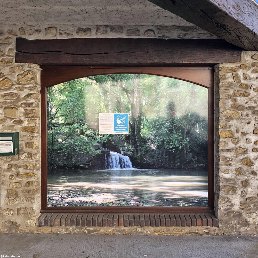 Waterfall on the Biocoop facade, La Ferté-Bernard, France