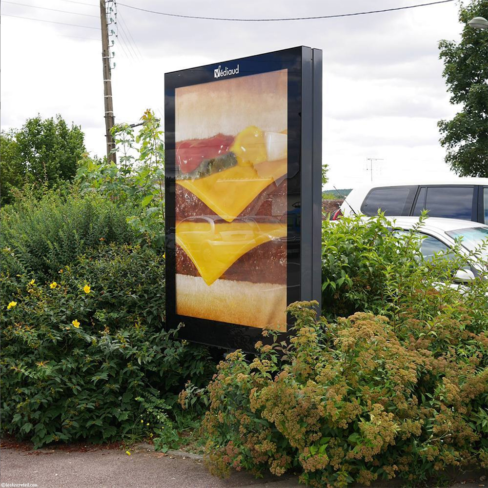 Advertising poster for McDonald's, La Ferté-Bernard, France