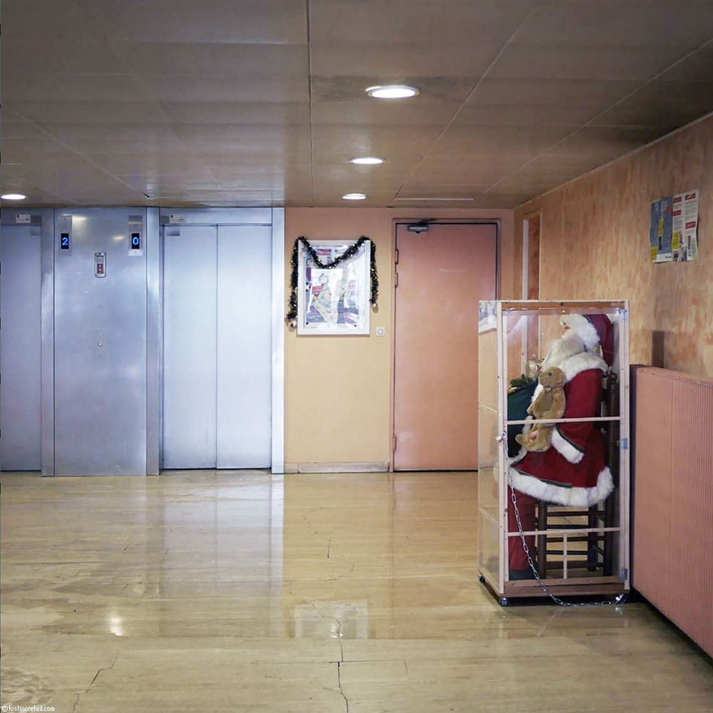 Christmas decorations in the lobby of a public housing building, Paris 13